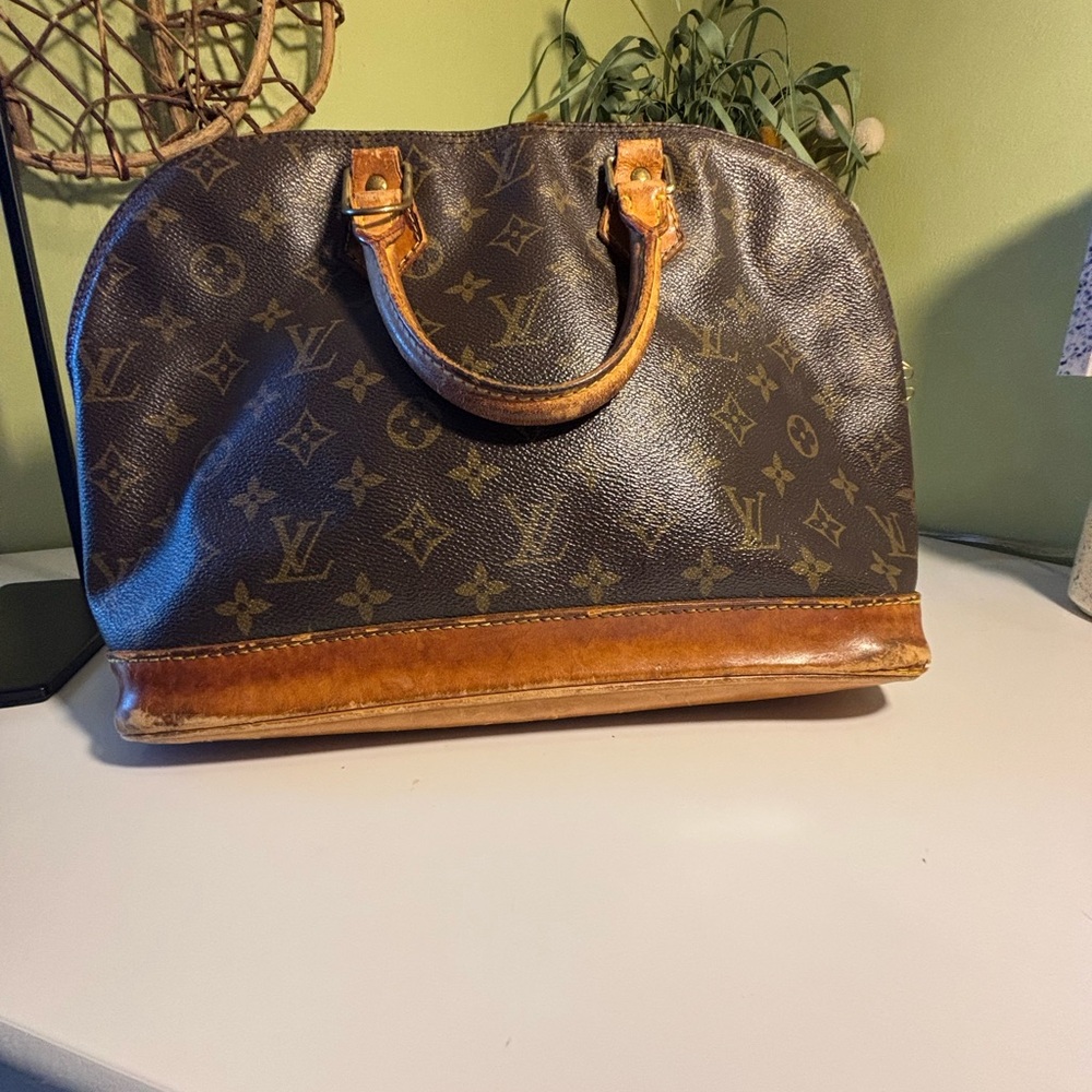Louis Vuitton Alma Monogram Satchel